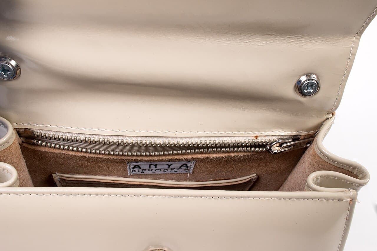 Interior and edge details of a structured handbag