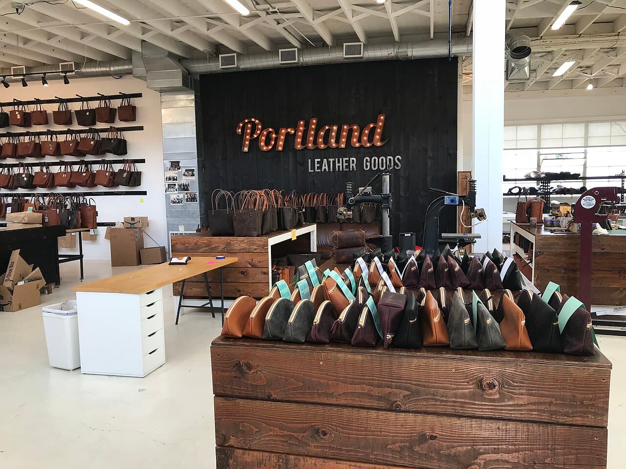 Leather goods arranged in a working atelier